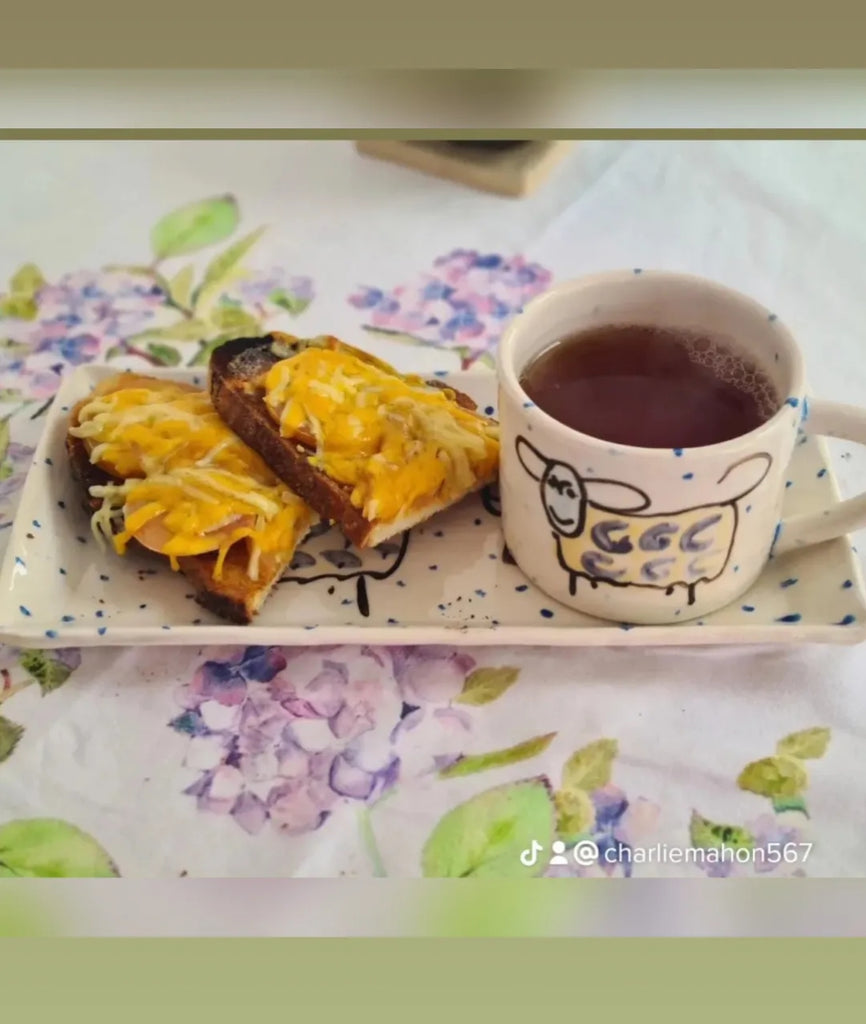 One ceramic Rectangular  Plate and  Large Mug with Irish Witty Sheep Design Design -periodic blue dots on luxurious white background serving Cheese and Toast