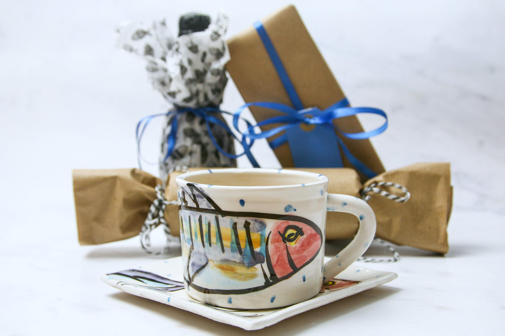 Hand painted luxurious ceramic mug with matching hand painted saucer 