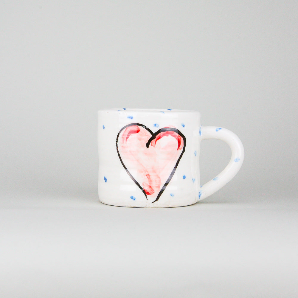 One large Mug hand painted with Pink Love Heart Design and periodic blue dots on a luxurious white background