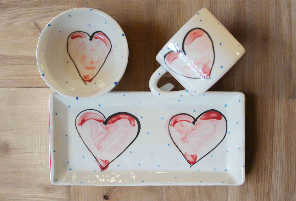 MUG AND BOWL WITH SERVING PLATE ALL WITH HANDPAINTED  HEART DESIGN ON LUXURIOUS WHITE GLAZE WITH PERIODIC BLUE DOTS