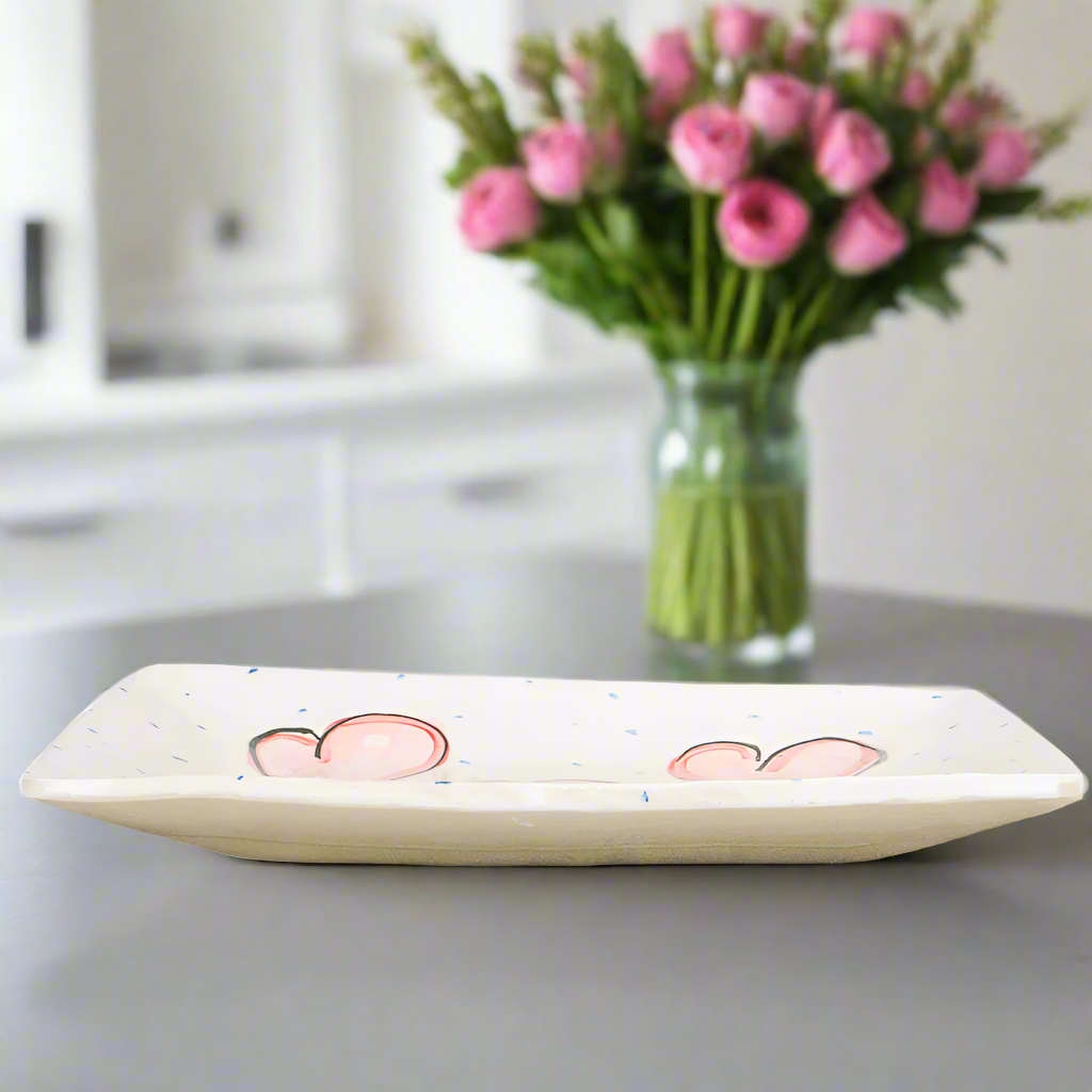 Large Irish ceramic platter for entertaining large gatherings.  Hand Painted with beautiful pink hearts, periodically dotted and signed by artist Charlie Mahon 