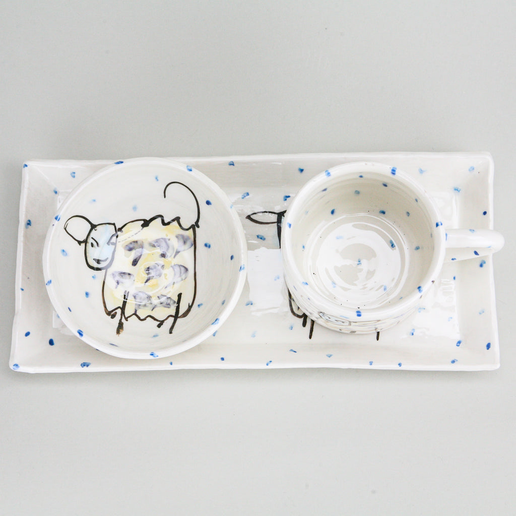 Large Irish Ceramic Mug and pottery bowl on a rectangular serving plate creating a unique 
gifting breakfast set with witty sheep pattern 