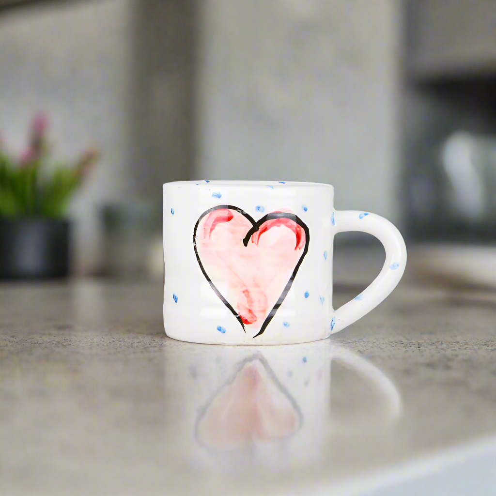 Irish ceramic coffee mug with hand painted pink gra heart pattern