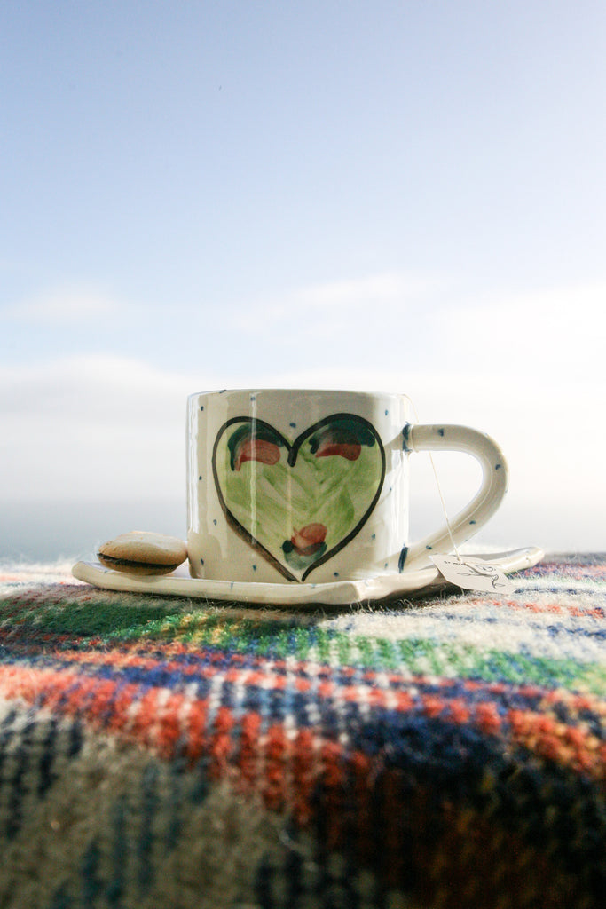 Large Irish pottery mug and saucer hand painted with spring green Hearts. A fantastic gift for birthdays or housewarmings.