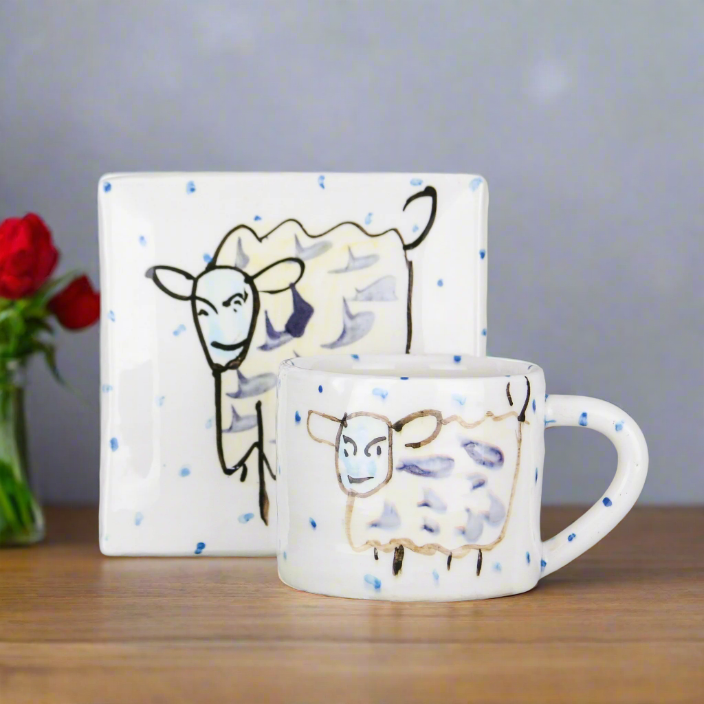 Irish pottery mug for coffee lovers with side plate in Sheep pattern