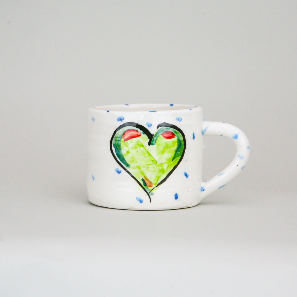 Large Irish mug handmade and individually hand painted with a green heart and blue polka dot pattern, perfect as a gift from the heart.