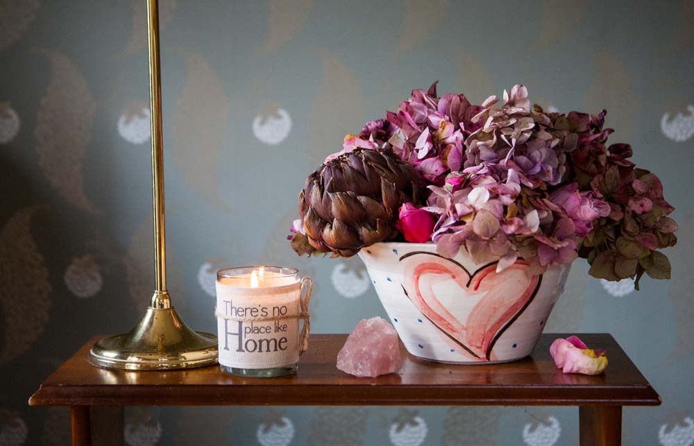 Inspired flower arrangement in handmade and hand painted pottery bowl with pink Heart Design, periodic blue polka dots on a beautiful white glaze.