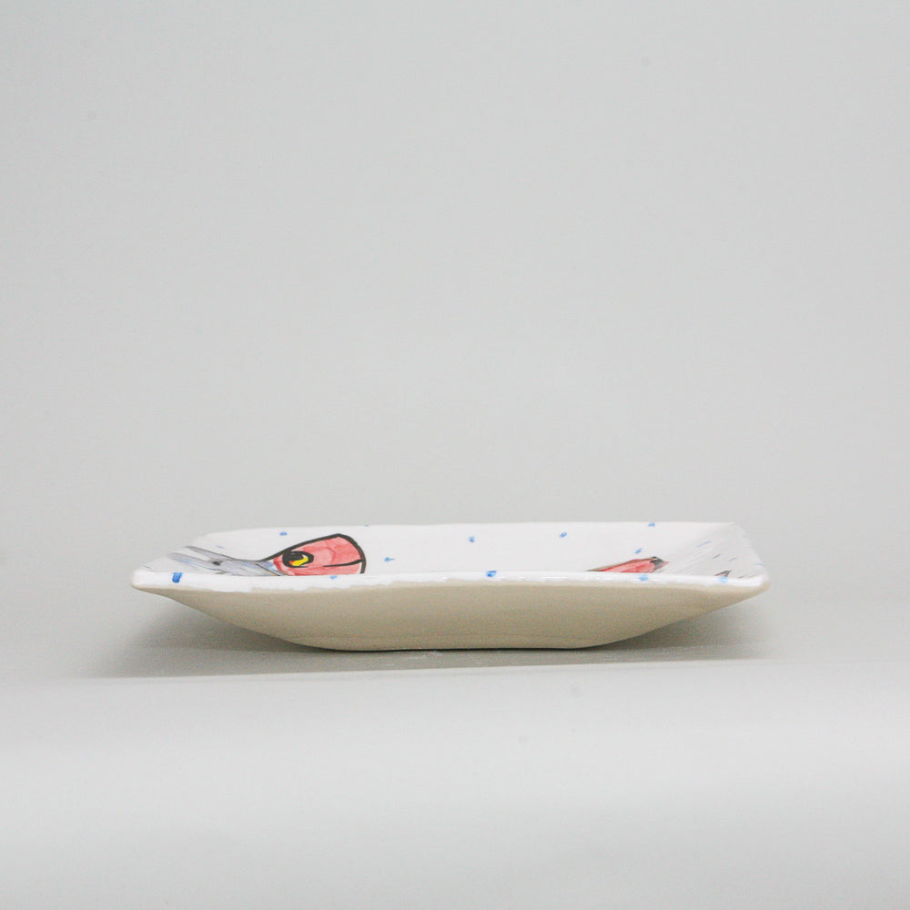 Medium square white Irish pottery with a hand-painted mackerel fish. The ceramics pottery is peppered with little blue dots. Handmade in Ireland.